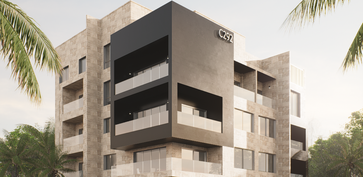 Modern residential building with cantilevered design and stone facade