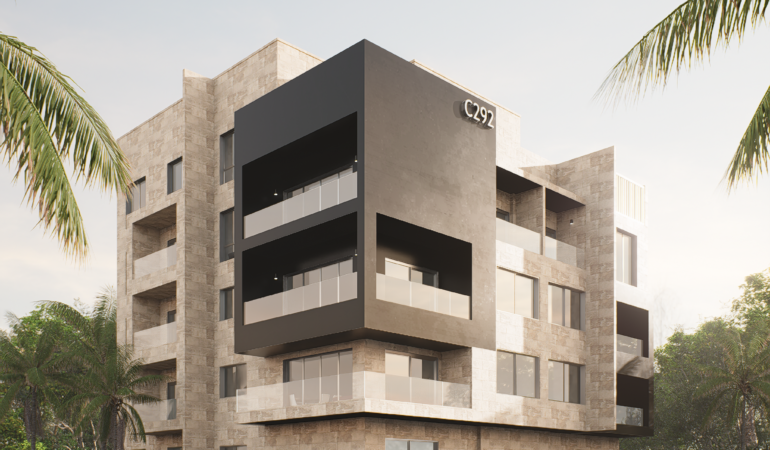 Modern residential building with cantilevered design and stone facade